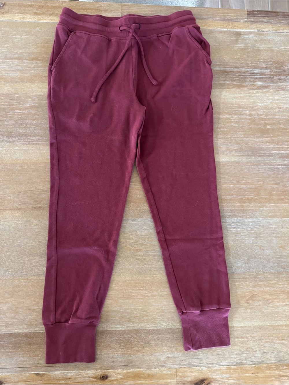 Kate Quinn maroon joggers